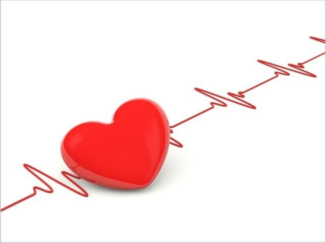 Heart with heartbeat isolated on white